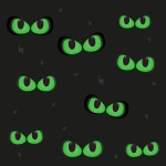 42706902 - green cat eyes glowing in the dark spooky